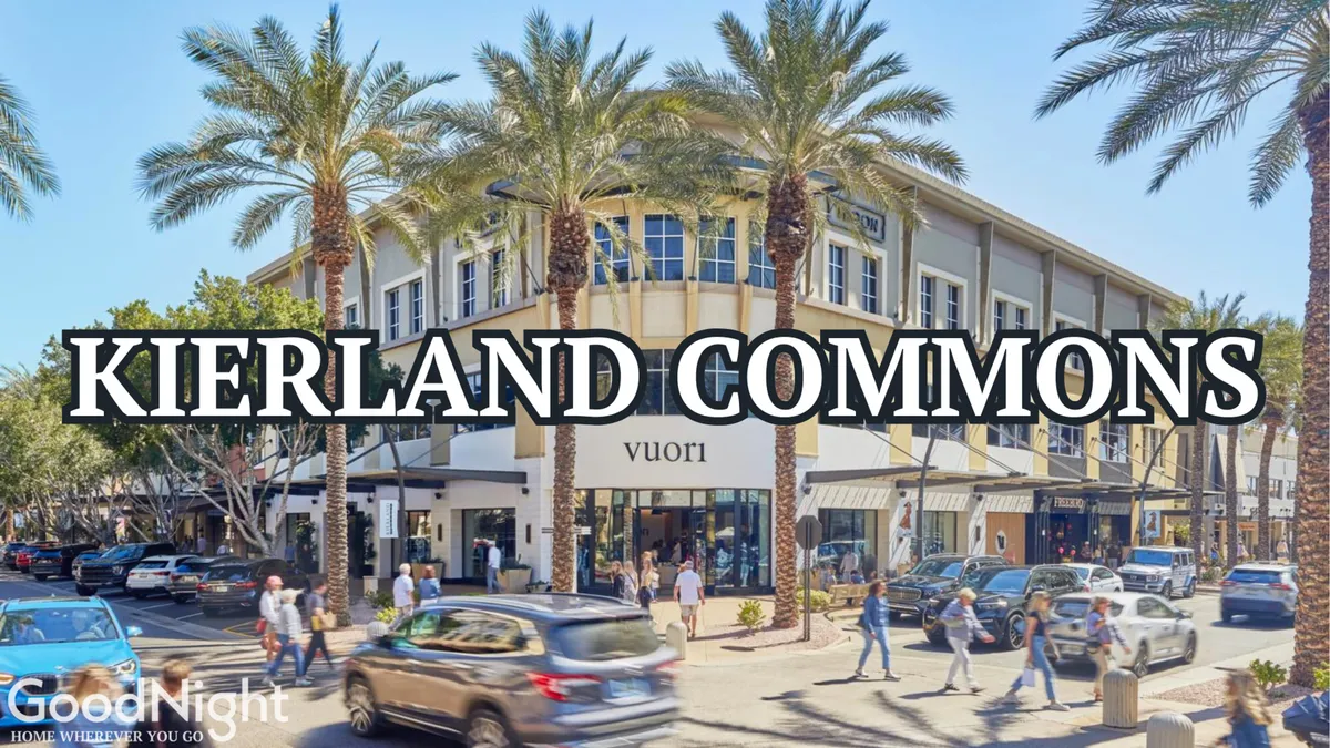 This image showcases palm trees lining a vibrant street filled with retail storefronts and pedestrians enjoying a lively atmosphere. The scene is bustling with activity, reflecting a dynamic shopping and dining district typical of the Scottsdale lifestyle.